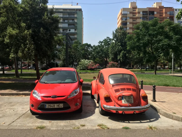 Swap a number plate between two cars